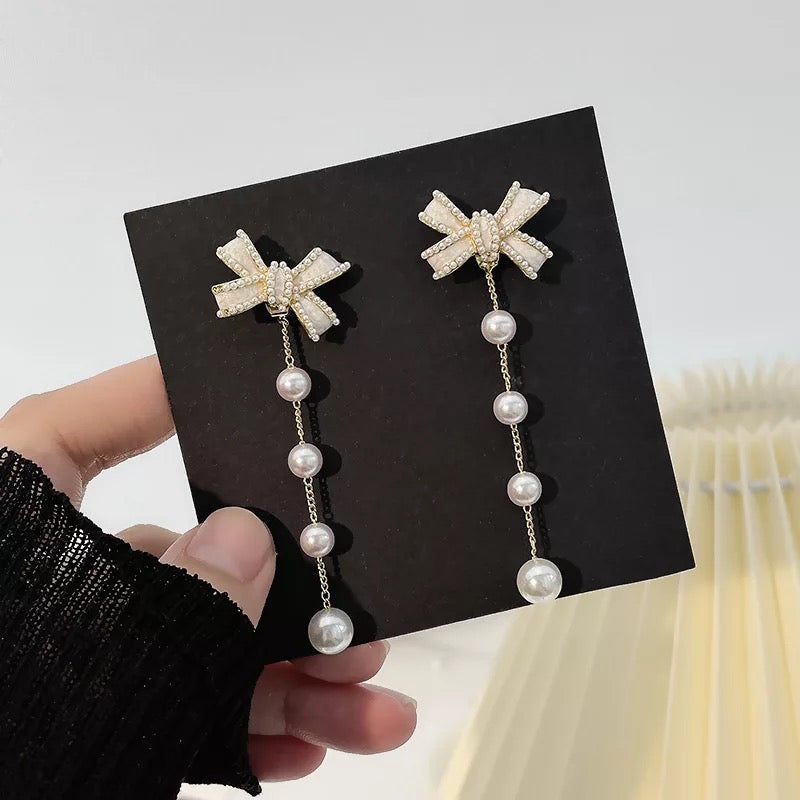 Boucles d'oreilles nœud papillon