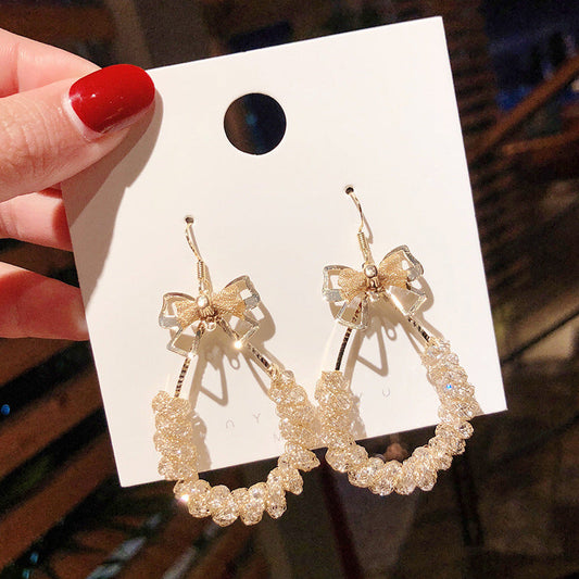 Boucle d'oreilles noeud papillon style princess